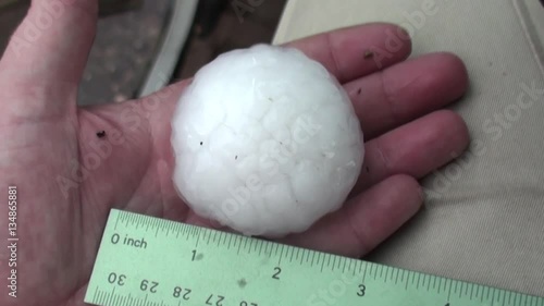 Two Inch Hailstone Hail in Hand
