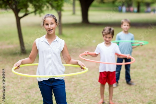 Kids playing with hula hoop