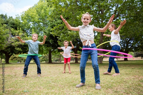 Kids playing with hula hoop