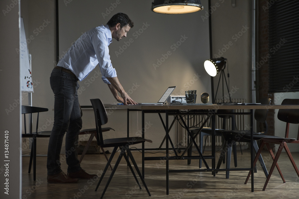 Businessman working late in office