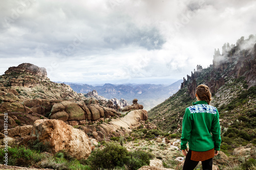 Woman on mountain admiring majestic landscape in Arizona  USA
