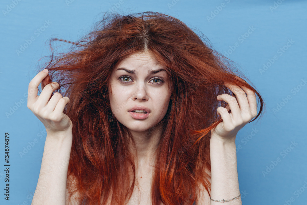 red-haired woman with disheveled hair red-haired woman with disheveled hair
