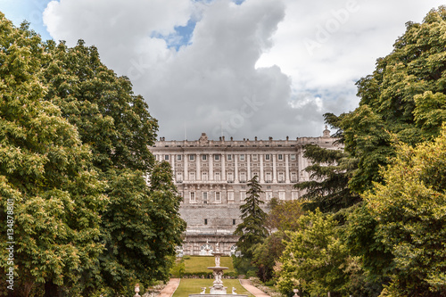 Gardens and royal palace of Madrid on a cloudy day