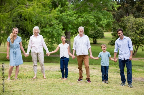 Multi-generation family enjoying together in park