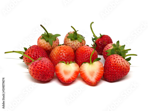 Group of fresh strawberries isolated on white background.