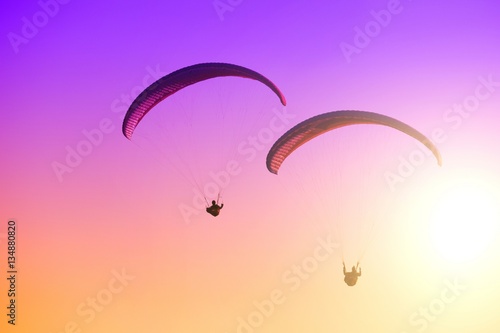 Paragliding on the sunset
