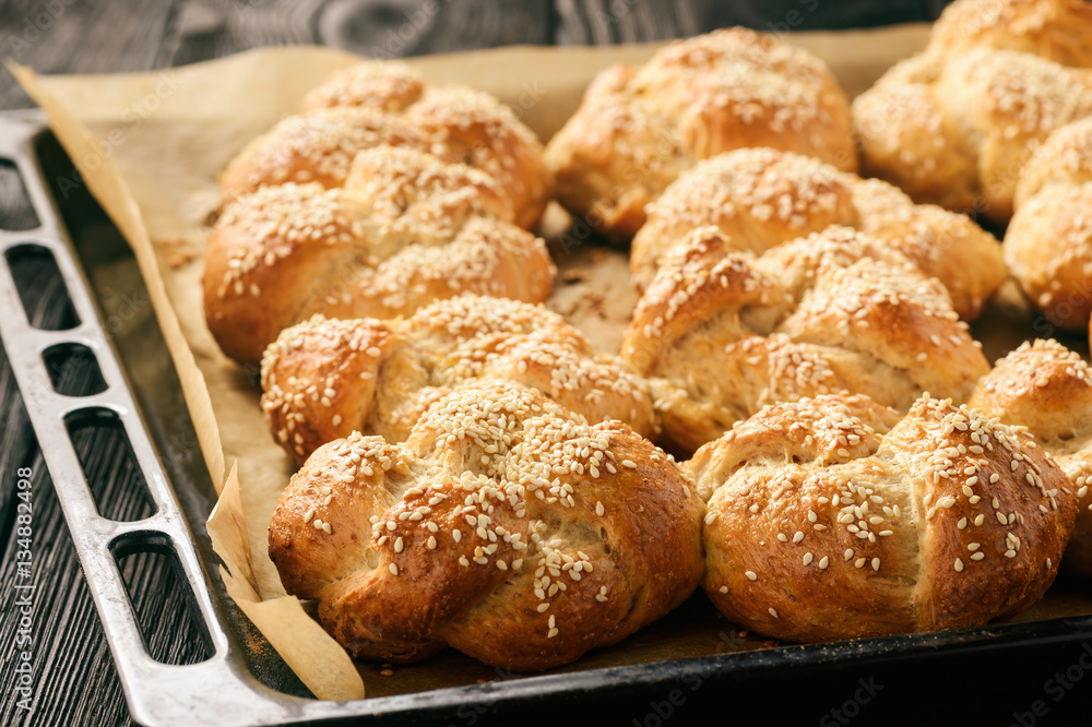 Homemade bread rolls with sesame seeds. Homemade bread rolls with sesame seeds.