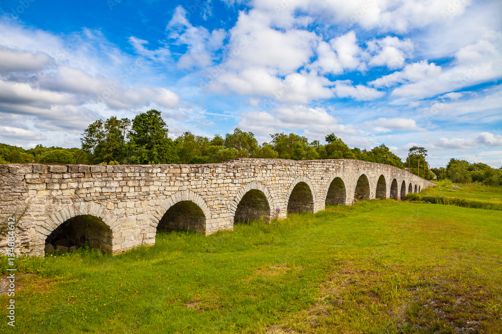 View of the Historic Old Stone Bridge over the river on Estonian island