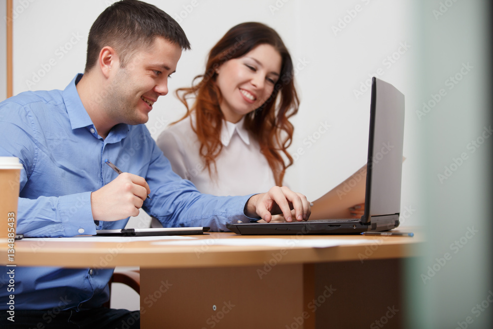 Office workers sitting at table Office workers sitting at table