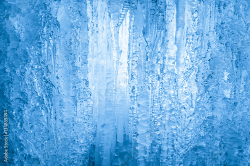 Frozen waterfall. Icicles structure