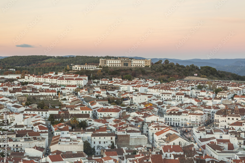 White architecture and red roofs in tourist Aracena's town. Huel