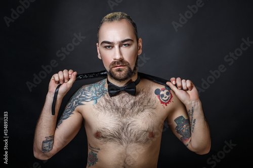 Quadro em tela man with a whip and tattoo