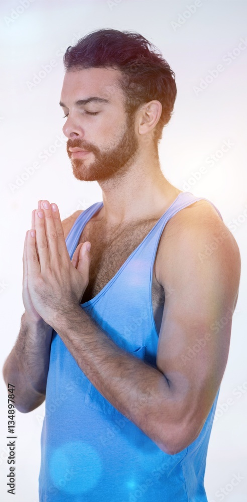 Man in lotus pose with eyes closed Man in lotus pose with eyes closed
