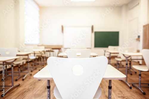 Empty classroom with chairs and desks