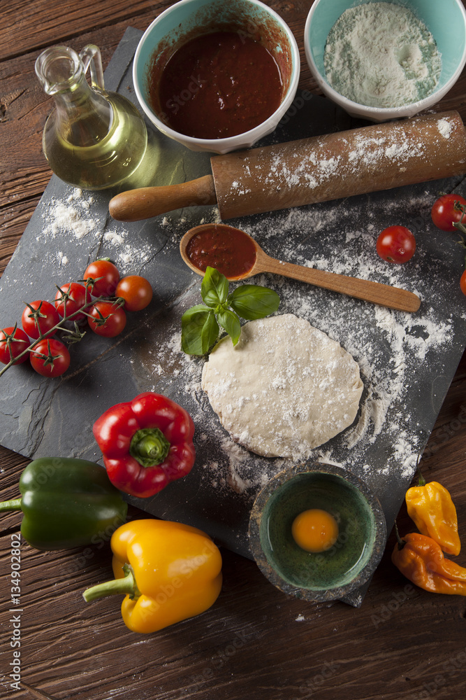 Fresh an tasty homemade pizza preparation Fresh an tasty homemade pizza preparation