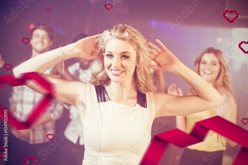 Composite image of portrait of cheerful woman dancing cheerfully