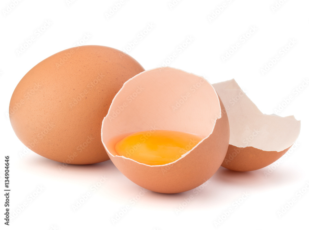 Broken egg in eggshell half and raw egg isolated on white backgr Broken egg in eggshell half and raw egg isolated on white backgr