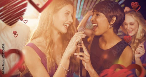 Composite image of beautiful women singing song together
