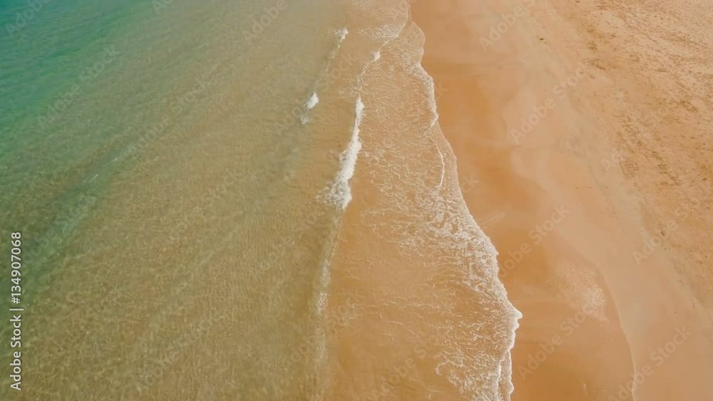 Aerial view of beautiful tropical island with sand beach. Tropical lagoon with turquoise water and yellow sand. Seascape: Ocean and a beautiful beach paradise. Beautiful view of a nice tropical beach Aerial view of beautiful tropical island with sand beach. Tropical lagoon with turquoise water and yellow sand. Seascape: Ocean and a beautiful beach paradise. Beautiful view of a nice tropical beach