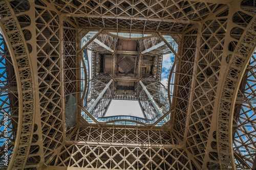 Partial view underneath the Eiffel Tower in Paris, France