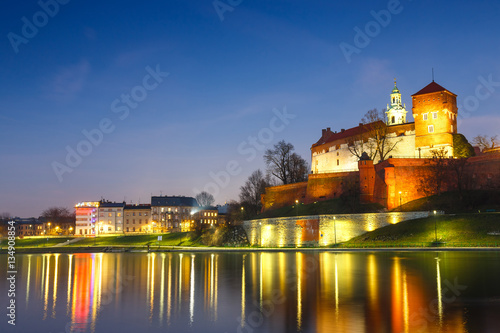 Wawel Castle in the evening in Krakow with reflection in the river, Poland. Long time exposure