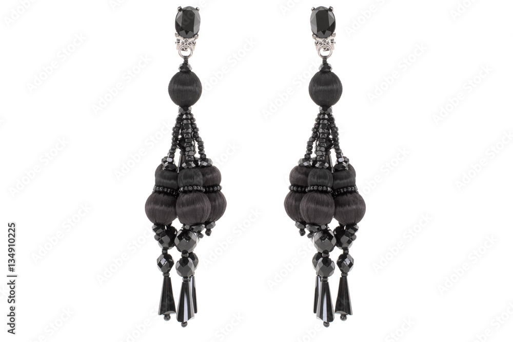 Jewelry on a white background. Women's earrings premium with precious stones. Isolate Jewelry. Briliant Jewelry on a white background. Women's earrings premium with precious stones. Isolate Jewelry. Briliant