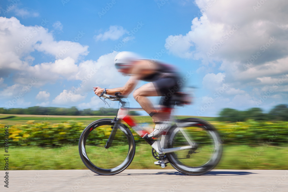 Racing Cyclist. Motion blurred image