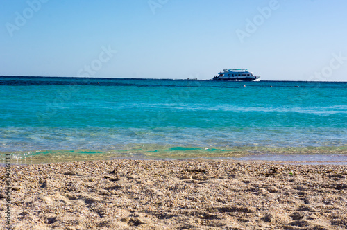 Nice view of the red sea from the paradise island. Ship passing by