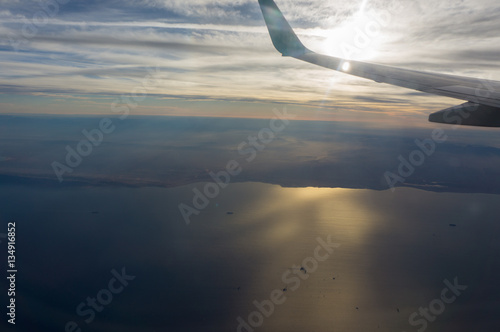 A view from the airplane window, sky in the beautiful sunset