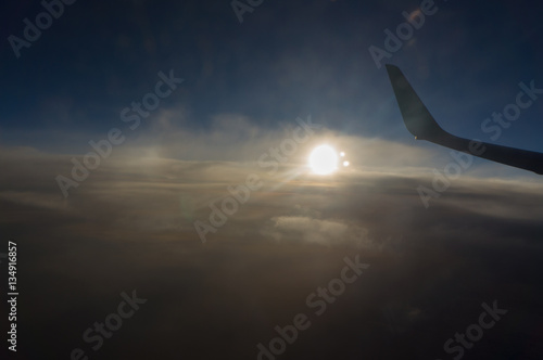 A view from the airplane window, sky in the beautiful sunset