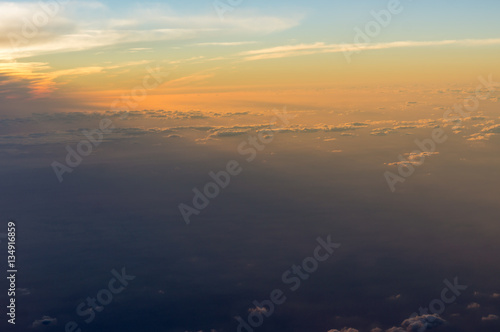 A view from the airplane window, sky in the beautiful sunset