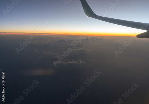 A view from the airplane window, sky in the beautiful sunset