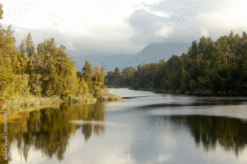 Clouds over Lake Matheson in the Glaciers Country on the South Island of New Zealand