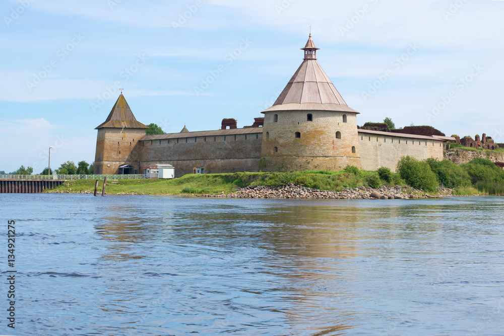 Golovin's tower and Monarchic tower of fortress Oreshek in the August afternoon. View from the water area of Neva. Russia