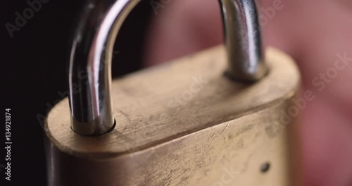 Person closes lock