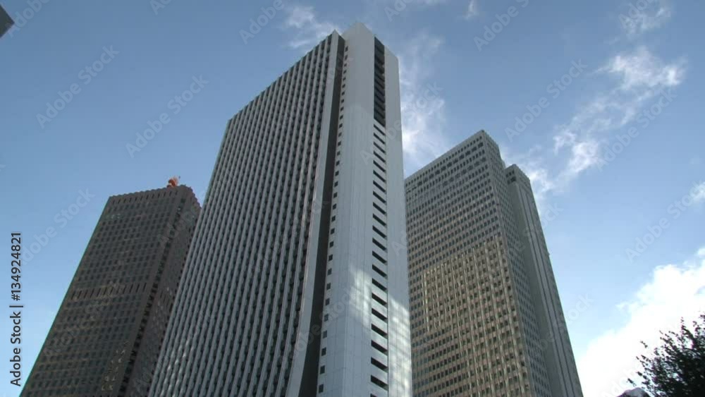 Skyscrapers tilt at a crossing in Shinjuku one of the 23 special wards of Tokyo, Japan. It is a major commercial and administrative centre Skyscrapers tilt at a crossing in Shinjuku one of the 23 special wards of Tokyo, Japan. It is a major commercial and administrative centre