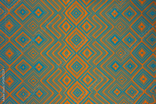 Colorful thai silk handcraft peruvian style rug surface close up More this motif & more textiles peruvian stripe beautiful background tapestry persian nomad detail pattern farabic fashionable textile.