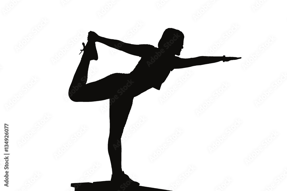 Fototapeta premium silhouette of woman exercising