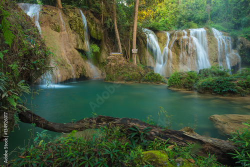 Fototapeta Naklejka Na Ścianę i Meble -  Tharn Sawan waterfall or Bor Beer waterfall is located in Doi Phu Narng national park, Chiang Muan district of Payao province, Thailand. 