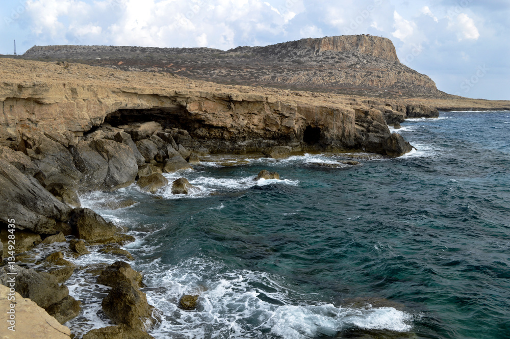 Rocky coast of Cape Greco with caves and grottoes in Cyprus.