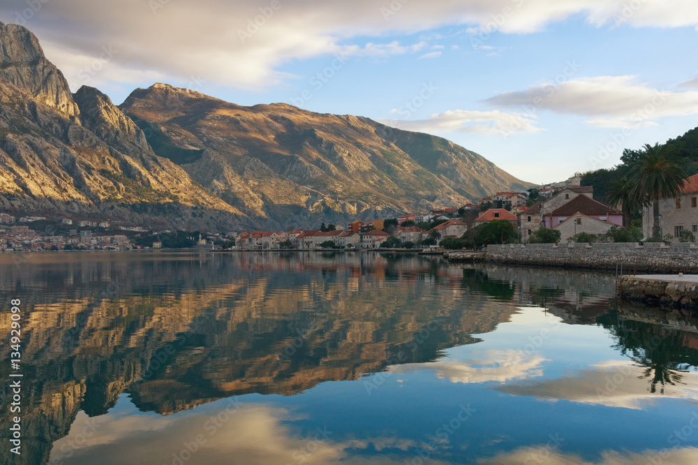 Reflections in water. Seaside Prcanj town, Montenegro