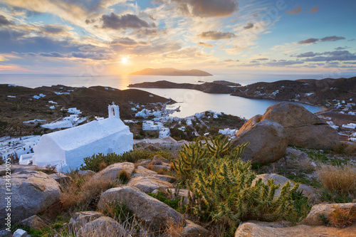 Church over chora on Ios island late in the evening. photo