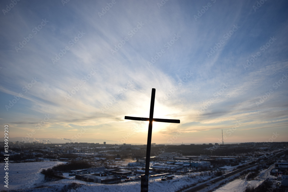 Orthodox cross on the hill against the evening sky Orthodox cross on the hill against the evening sky