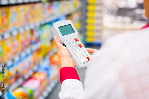 Sales Clerk At The Supermarket
