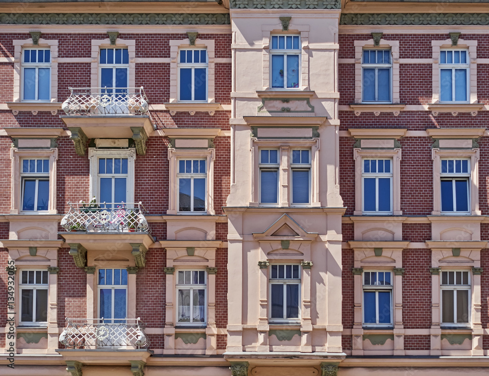 Fototapeta premium pink and bordeaux vintage house facade, Germany