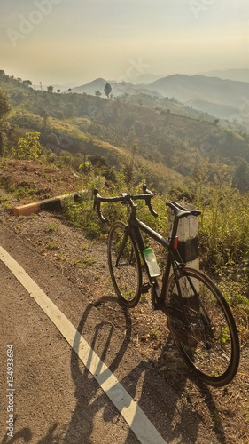 riding a bicycle on hill photo