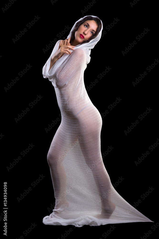 Fototapeta premium Elegant pose in white fabric