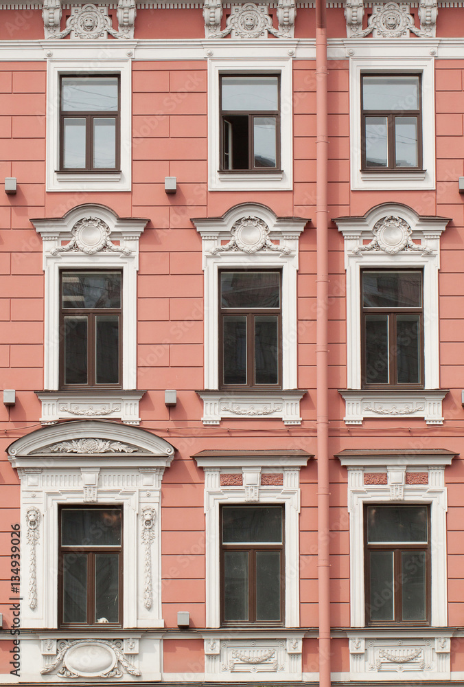 windows with moldings in an old building windows with moldings in an old building
