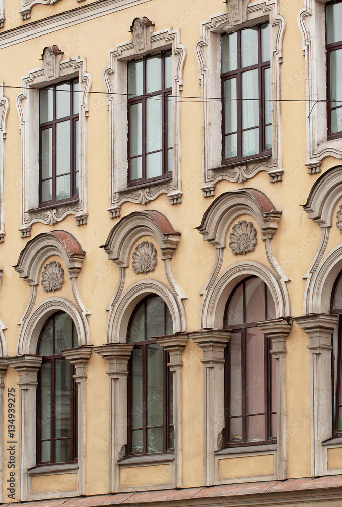 Fototapeta premium windows with moldings in an old building