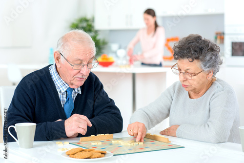 Old couple playing a game